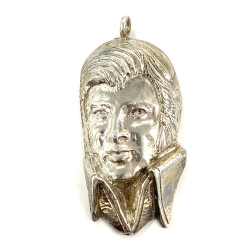 391 - Solid Silver hallmarked Novelty Elvis Presley pendant total weight 28 grams