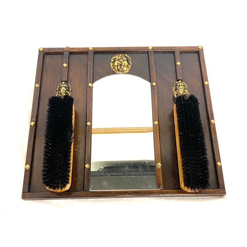 61 - Wall hanging mirrored vintage brush set, approximate measurements: Height 13 inches, Width 14.5 inch... 