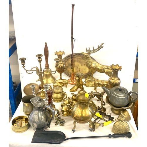 275 - Large selection of brassware to include: vases, animal pieces, lady bell, bell etc