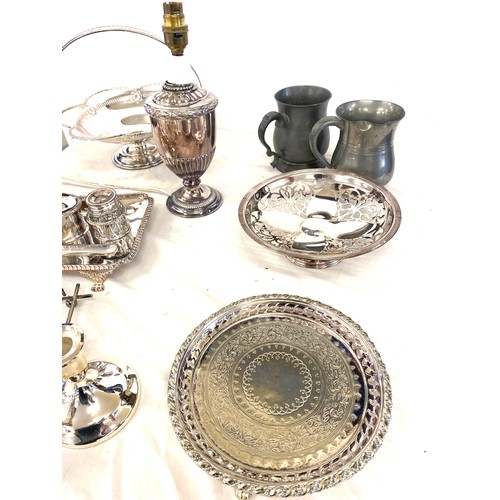 165 - Selection of silver plate to include tankards, toast rack, lamp etc