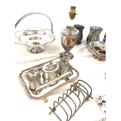 165 - Selection of silver plate to include tankards, toast rack, lamp etc