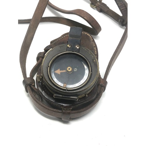 422 - ww1 british officers compass in leather case both dated 1918 marked e.koehn .geneve swiss