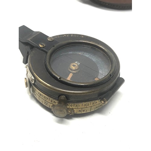 422 - ww1 british officers compass in leather case both dated 1918 marked e.koehn .geneve swiss