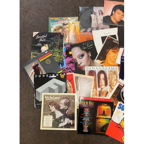 169 - Selection of assorted vinyl records to include Grease, hits for lovers, Pat Benatar, Diana Ross etc