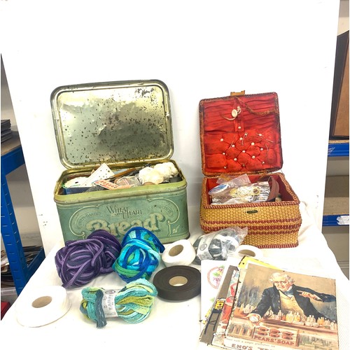 271 - Selection of sewing accessories to include cotton, sewing baskets, needles, threads etc