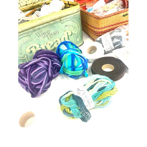 271 - Selection of sewing accessories to include cotton, sewing baskets, needles, threads etc