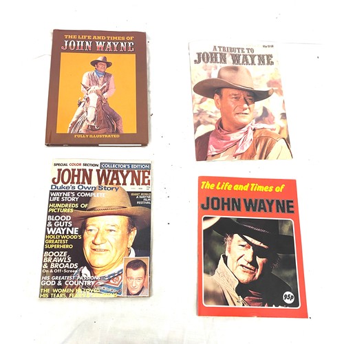 338 - Selection John Wayne books one hard back cover and three magazines to include the life and times of ... 