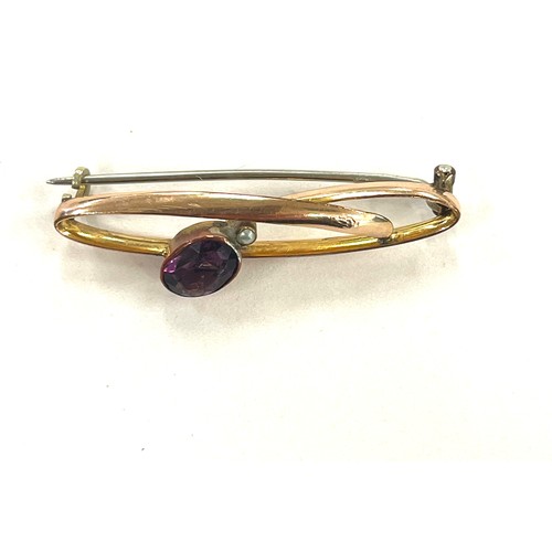 388 - 14ct Gold amethyst and seed pearl metal pin brooch total weight 2.7g