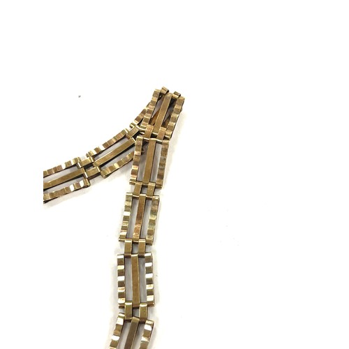 385 - 9ct Gold ladies gate bracelet, hallmarked total weight 7.4grams