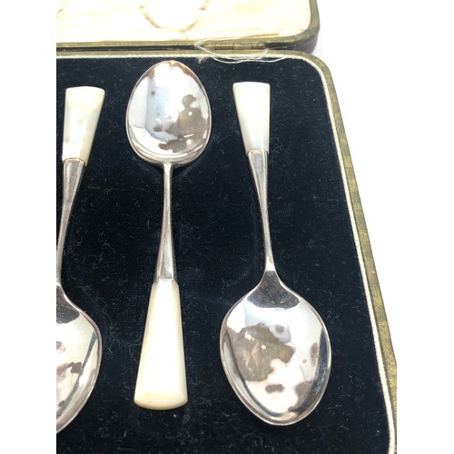 483 - Boxed set of 6 sterling silver with m.o.p handles tea spoons