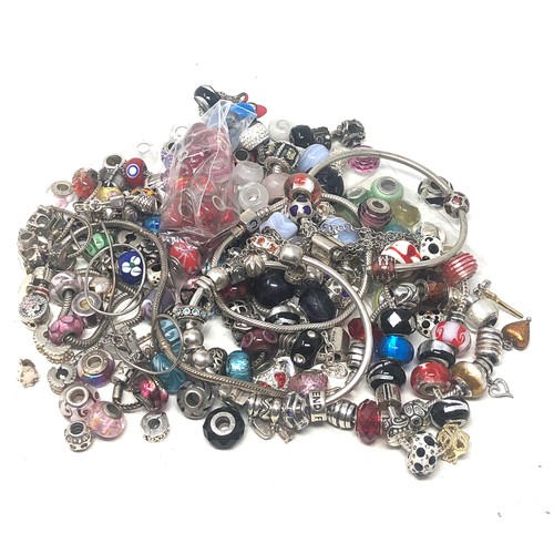 381 - 600g of charms inc Sterling Silver mixed brand charms & charm bracelets