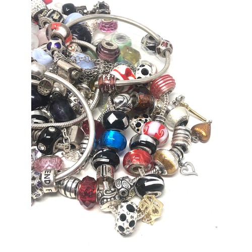 381 - 600g of charms inc Sterling Silver mixed brand charms & charm bracelets