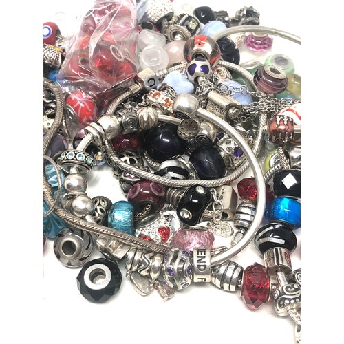 381 - 600g of charms inc Sterling Silver mixed brand charms & charm bracelets