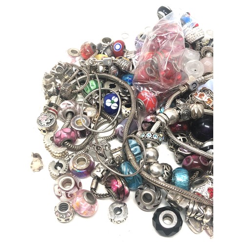 381 - 600g of charms inc Sterling Silver mixed brand charms & charm bracelets