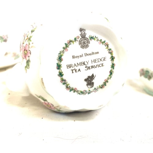 450 - Royal Doulton Brambly Hedge miniature tea set comprising of a teapot, cup and saucer, milk jug and s... 