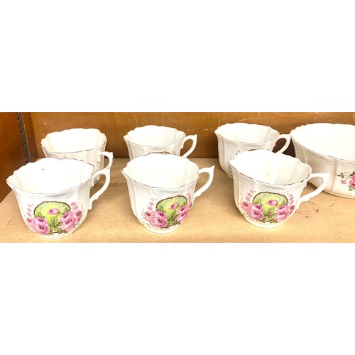 140 - Vintage part tea service to include six cups, six saucers, six sandwich plates, sugar bowl and and m... 