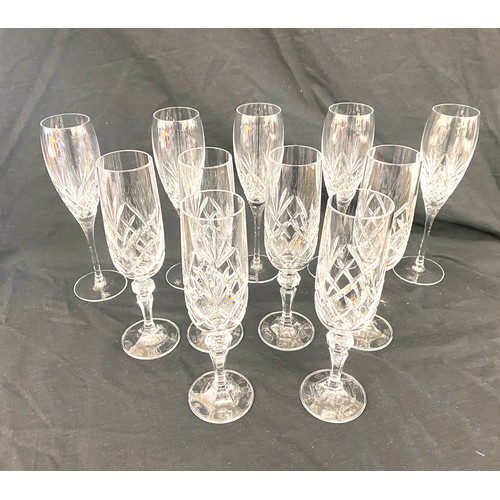 283 - Selection of 11 Crystal Champagne flutes (5 of which are Royal Doulton), all in good overall conditi... 