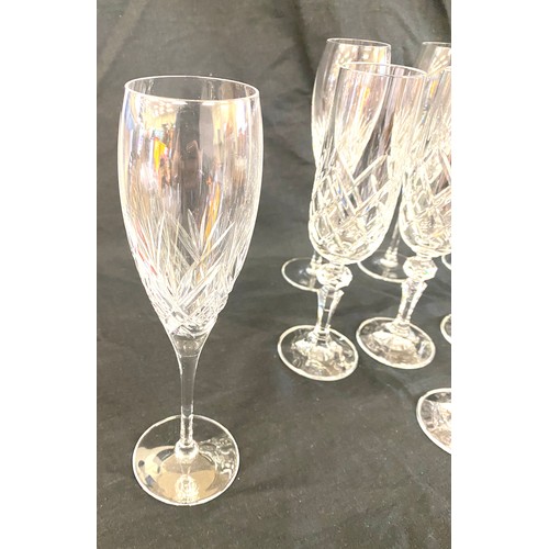 283 - Selection of 11 Crystal Champagne flutes (5 of which are Royal Doulton), all in good overall conditi... 