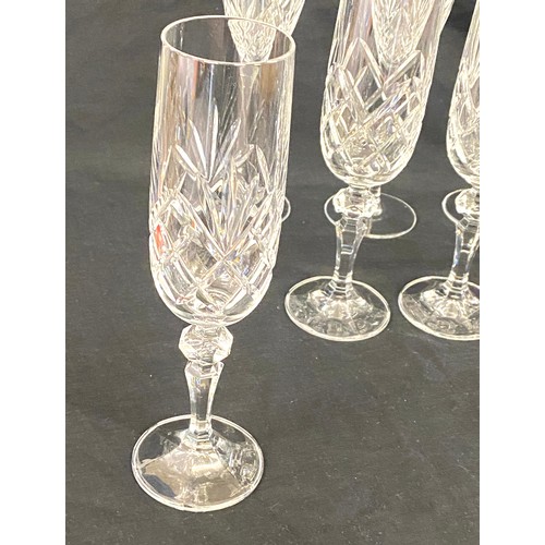 283 - Selection of 11 Crystal Champagne flutes (5 of which are Royal Doulton), all in good overall conditi... 