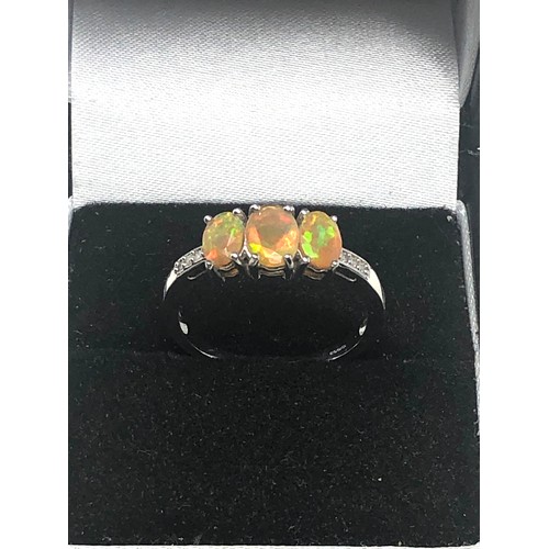 275 - 9ct White Gold Diamond Sided Opal Ring (2g)