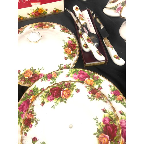 266 - 22 pieces of Royal Albert Country Rose to include tea pot, gravy boat, plates etc 
Some pieces have ... 