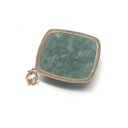 325 - 9ct Gold Framed Jade Pendant (11.4g)