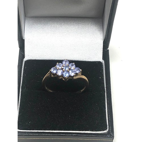 327 - 9ct Gold Tanzanite Cluster Fronted Ring (2.9g)