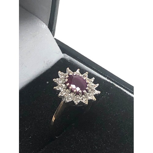 234 - 9ct Gold Diamond Framed Ruby Halo Ring (2.2g)