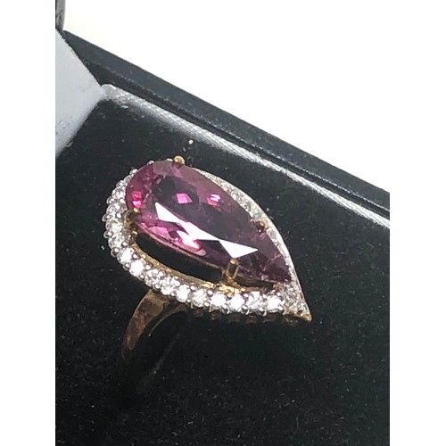 323 - 9ct Gold Diamond Framed Pearl Cut Tourmaline Ring (2.9g)