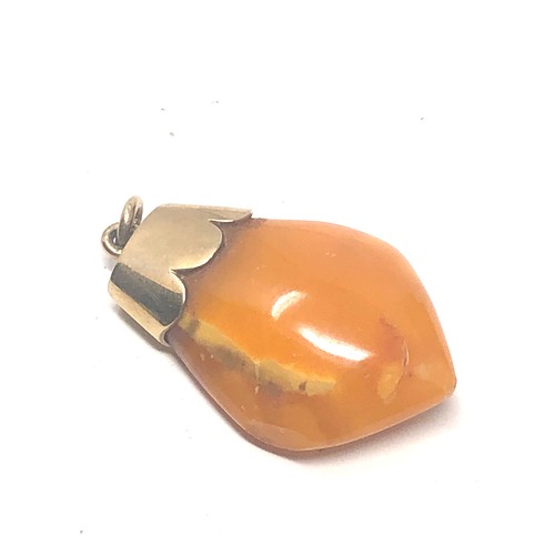 329 - 9ct Gold Bailed Butterscotch Amber Pendant (4.9g)