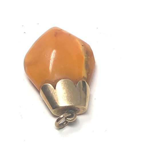 329 - 9ct Gold Bailed Butterscotch Amber Pendant (4.9g)