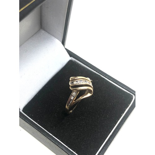 159 - 9ct Gold Diamond Stylised Twist Setting Ring (2g)