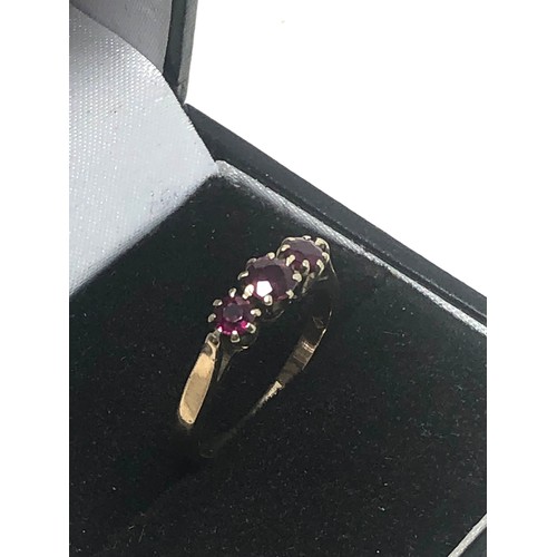 162 - 9ct Gold Ruby Trilogy Ring (2.3g)