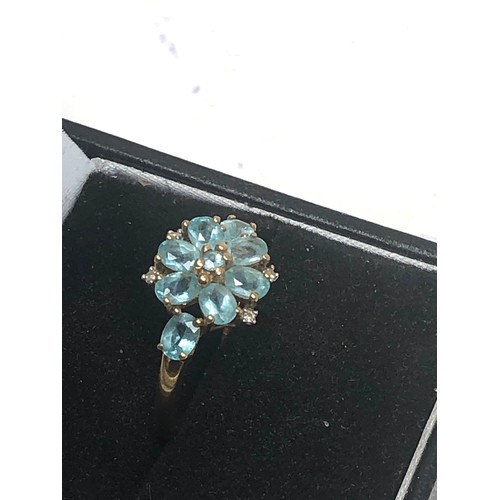 334 - 9ct Gold Diamond & Blue Gemstone Floral Set Ring (2g)