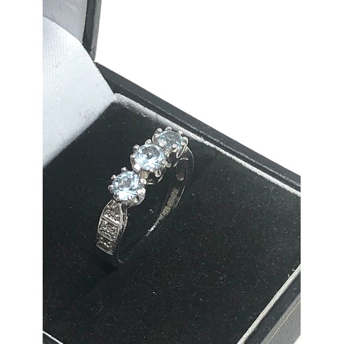 299 - 9ct White Gold Diamond & Topaz Fronted Ring (2.7g)