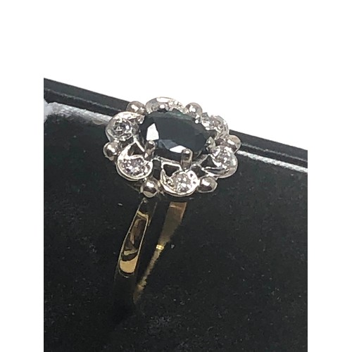 292 - 18ct Gold Diamond Framed Sapphire Halo Ring (4.5g)