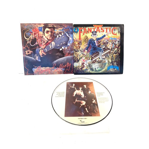 167 - Three vinyl records to include City to City by Gerry Rafferty, Captain Fantastic Elton John and Span... 