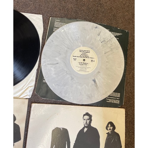 173 - 2 copies of The Stranglers vinyls to include black and white marble edition