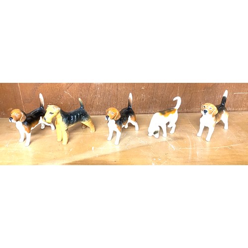 147 - Set of five Beswick dog ornaments all in good overall condition