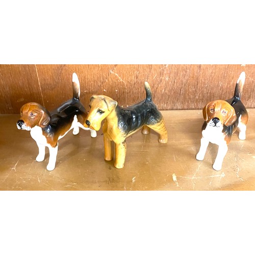 147 - Set of five Beswick dog ornaments all in good overall condition