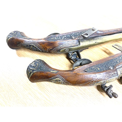 76 - Two vintage wall hanging Flintlock display pistols