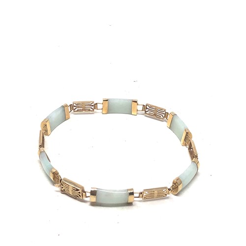 123 - 9ct gold jade panel bracelet (8.3g)