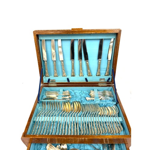 328 - Cased stainless steel canteen of cutlery