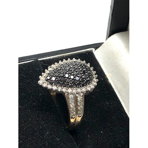 40 - Fine 9ct gold diamond ring set with central black diamonds with diamond halo & diamond shoulders wei... 