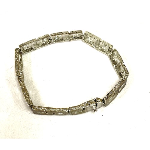 398 - Silver stone set bracelet with crab claw fastening