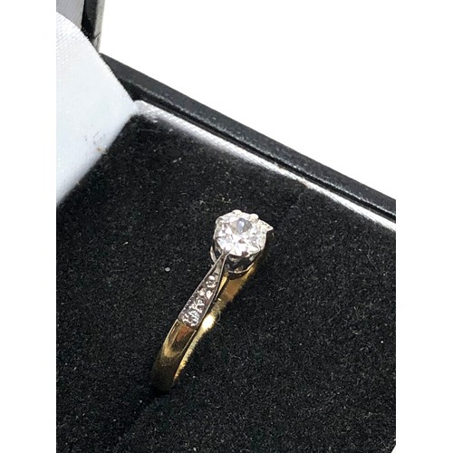 88 - Fine 18ct  gold diamond ring set with central diamond measures approx 4.5mm with  diamond shoulders