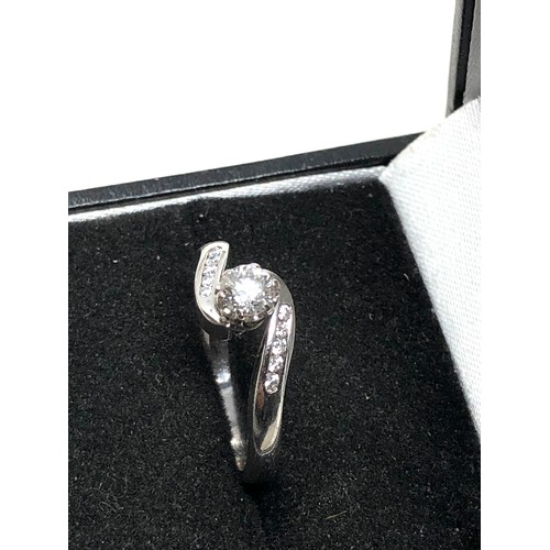 78 - Fine 18ct white gold diamond ring set with central diamond measures approx 4mm with  diamond shoulde... 