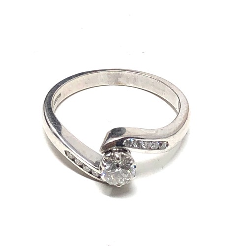 78 - Fine 18ct white gold diamond ring set with central diamond measures approx 4mm with  diamond shoulde... 