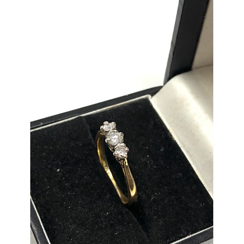 79 - 18ct gold diamond ring set with 3 diamonds weight 2.5g