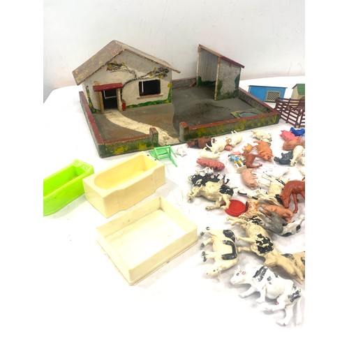 133 - Vintage farm yard and a selection of animal figures to include Britains et